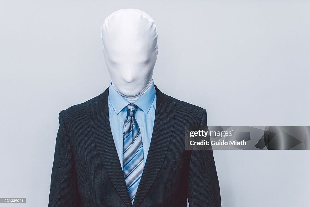 Masked businessman.