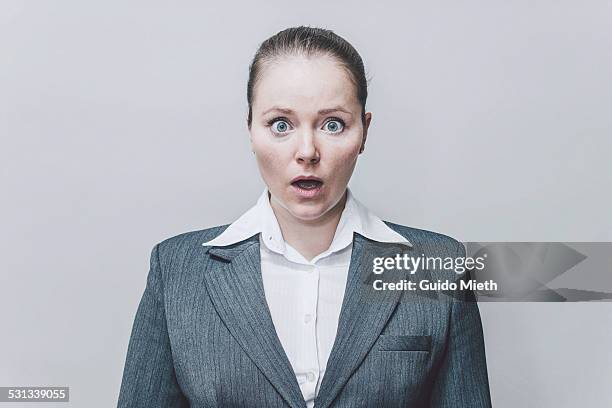 businesswoman wondering. - scared portrait stock pictures, royalty-free photos & images