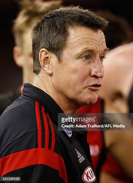 John Worsfold, Senior Coach of the Bombers addresses his players during the 2016 AFL Round 08 match between the Essendon Bombers and the North...