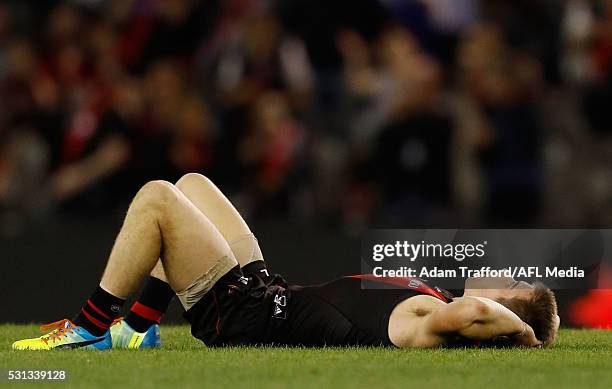 Zach Merrett of the Bombers looks dejected after a loss during the 2016 AFL Round 08 match between the Essendon Bombers and the North Melbourne...