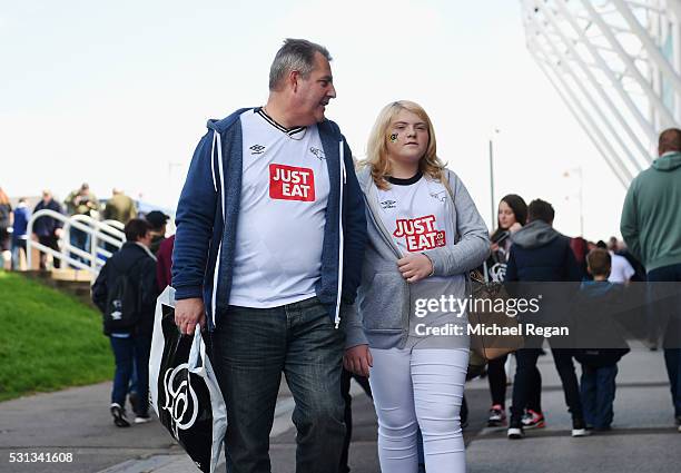 Derby fans walk outside the stadium prior to the Sky Bet Championship Play Off semi final first leg match between Derby County and Hull City at the...