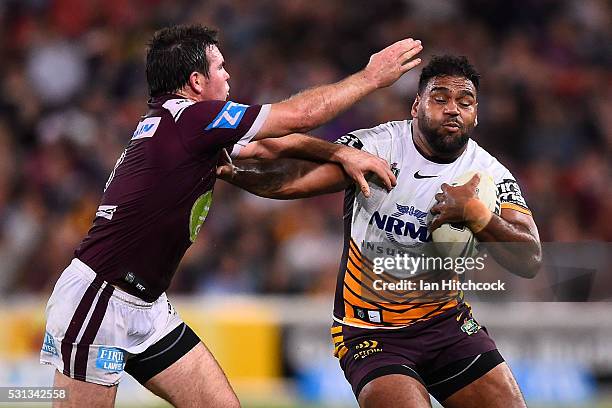 Sam Thaiday of the Broncos is tackled by Jamie Lyon of the Sea Eagles during the round 10 NRL match between the Manly Sea Eagles and the Brisbane...