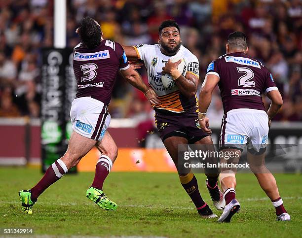 Sam Thaiday of the Broncos is tackled by Jamie Lyon and Matthew Wright of the Sea Eagles during the round 10 NRL match between the Manly Sea Eagles...