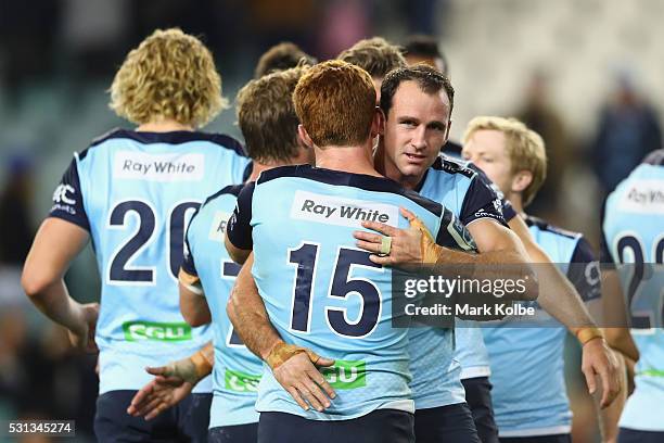 Andrew Kellaway and Matt Carraro of the Waratahs celebrate victory during the round 12 Super Rugby match between the Waratahs and the Bulls at...