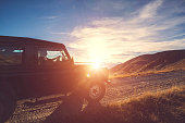 Four Wheel drive on Mountain at Sunset with