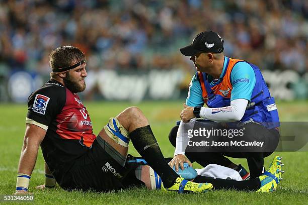 Jason Jenkins of the Bulls receives attention for an injury during the round 12 Super Rugby match between the Waratahs and the Bulls at Allianz...