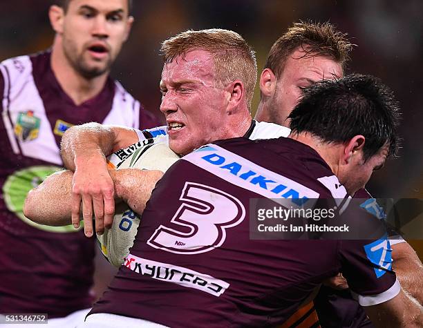 Jack Reed of the Broncos is tackled by Jamie Lyon of the Sea Eagles during the round 10 NRL match between the Manly Sea Eagles and the Brisbane...