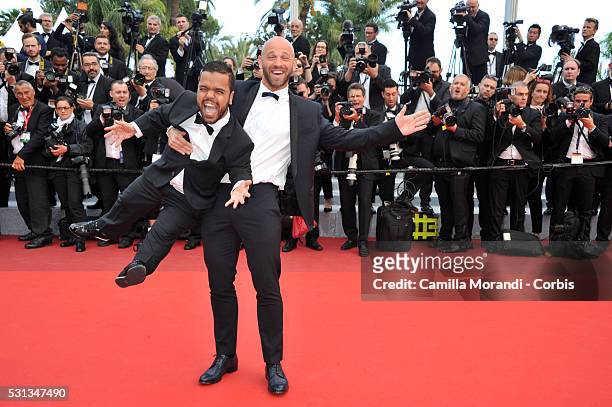 Franck Gastambide and guest attend 'Money Monster' Red carpet prior to the 69th annual Cannes Film Festival on May 10, 2016 in Cannes, France.