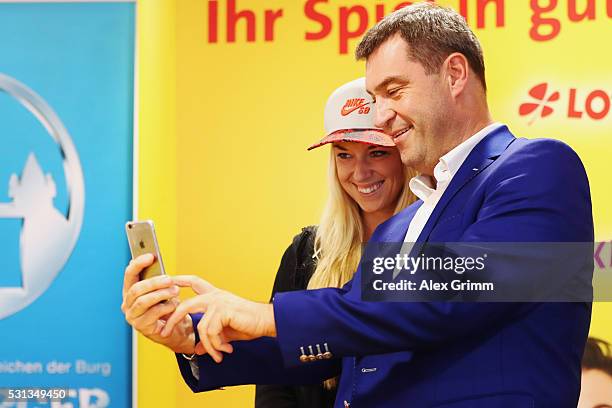 Bavarian Finance Minister Markus Soeder takes a selfie with Sabine Lisicki of Germany during the official draw ceremony on Day One of the Nuernberger...