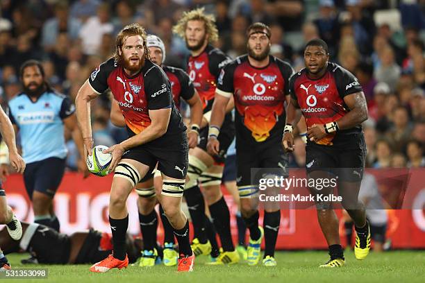 Jannes Kristen of the Bulls passes during the round 12 Super Rugby match between the Waratahs and the Bulls at Allianz Stadium on May 14, 2016 in...