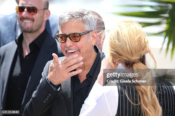 Actor George Clooney jokes during the "Money Monster" photocall during the 69th annual Cannes Film Festival at the Palais des Festivals on May 12,...