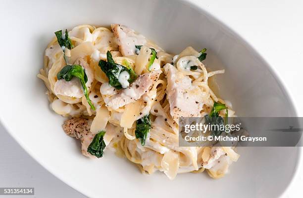 chicken alfredo - shaved parmesan stock pictures, royalty-free photos & images