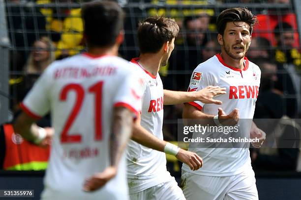 Milos Jojic of Koeln celebrates after scoring his team's second goal during the Bundesliga match between Borussia Dortmund and 1. FC Koeln at Signal...
