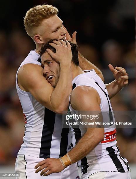 Adam Treloar and Jarryd Blair of the Magpies celebrate during the 2016 AFL Round 08 match between the Brisbane Lions and the Collingwood Magpies at...