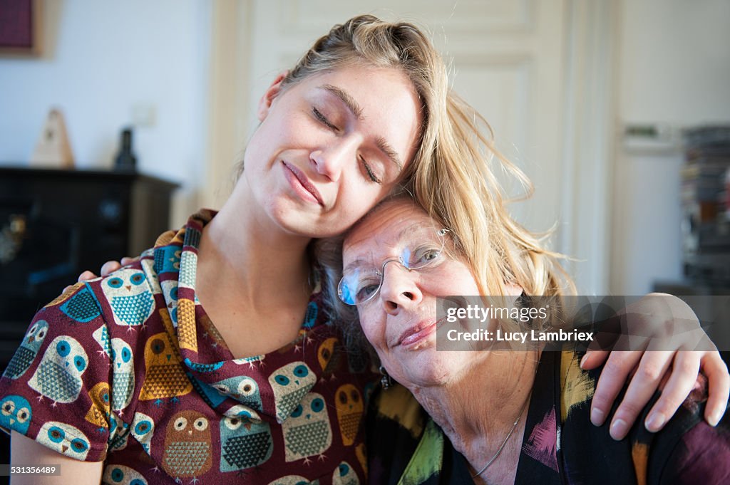 Grandchild holding grandmother