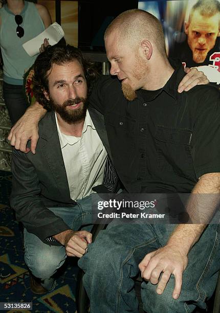 Rugby Player Mark Zupan and director Dana Adam Shapiro attend the premiere of "Murderball" on June 22, 2005 in New York City.