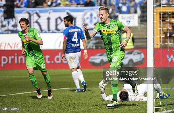 Andre Hahn of Borussia Moenchengladbach celebrates the second goal for his team during the first bundesliga match between SV Darmstadt 98 and...