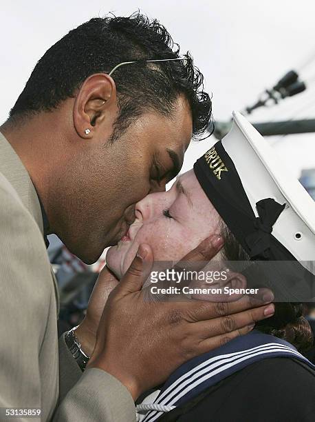 Anna Bumsord is reunited with her partner after the HMAS Tobruk returns home to Fleet Base East from the Middle East June 23, 2005 in Sydney,...