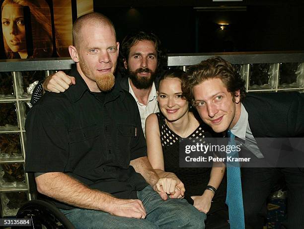 Rugby Player Mark Zupan, director Dana Adam Shapiro, Actor Winona Ryder and Director Henry-Alex Rubin attend the premiere of "Murderball" on June 22,...