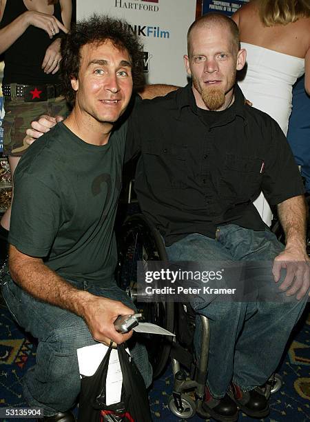 Rugby Player Mark Zupan and director Doug Liman attend the premiere of "Murderball" on June 22, 2005 in New York City.