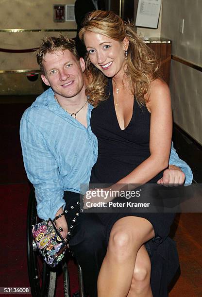 Rugby player Scott Hogsett and guest attend the after party for the premiere of "Murderball" on June 22, 2005 in New York City.