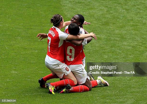 Danielle Carter, Asisat Oshoala and Natalia Pablos Sanchon of Arsenal Ladies celebrate victory on the final whistle during the SSE Women's FA Cup...