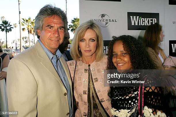 Larry Gilman, actress Donna Mills and daughter Chloe arrive at the Los Angeles Premiere of the Broadway musical "Wicked" at the Pantages Theatre on...