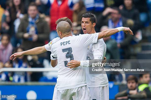 Cristiano Ronaldo of Real Madrid celebrates after scoring his team's second goal during the La Liga match between RC Deportivo La Coruna and Real...
