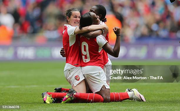 Natalia Pablos Sanchon, Dan carter and Asisat Oshoala celebrate victory over Chelsea during the SSE Women's FA Cup Final between Arsenal Ladies and...