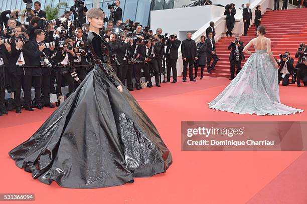 Li Yuchun AKA Chris Lee and Araya A. Hargate attend "The BFG " premiere during the 69th annual Cannes Film Festival at the Palais des Festivals on...