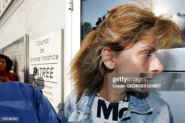 Former prostitute Florence Khelifi known as Fanny arrives at the Toulouse court-house, 23 June 2005, where, along with another prostitute Christele...