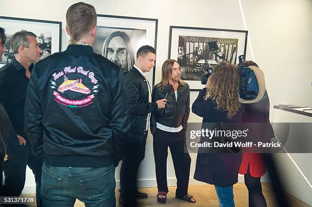 Iggy Pop and Matt Helders attend Iggy Pop Post Depression Art Pictures exhibition at French Paper Gallery on May 14, 2016 in Paris, France.