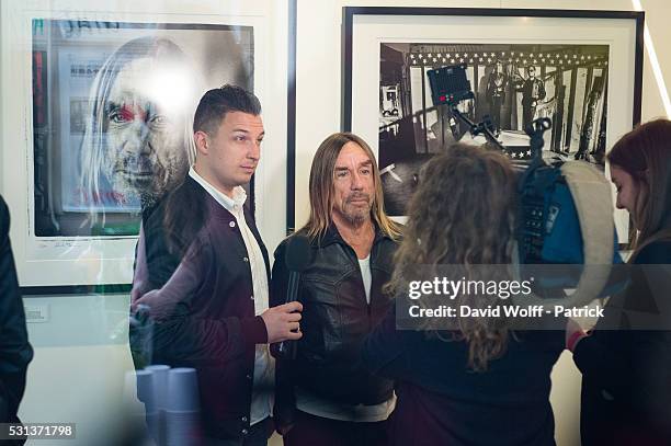 Iggy Pop and Matt Helders attend Iggy Pop Post Depression Art Pictures exhibition at French Paper Gallery on May 14, 2016 in Paris, France.