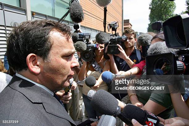 Francis Szpiner lawyer of former mayor of Toulouse Dominique Baudis talks to journalists, 23 June 2005, as she leaves Toulouse court-house where...