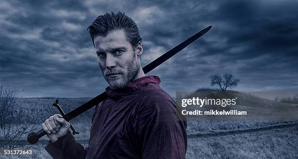 porträt von viking krieger mit einem schwert - ritter stock-fotos und bilder