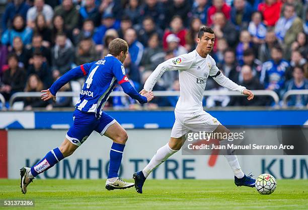 Cristiano Ronaldo of Real Madrid duels for the ball with Alex Bergantinos of RC Deportivo La Coruna during the La Liga match between RC Deportivo La...