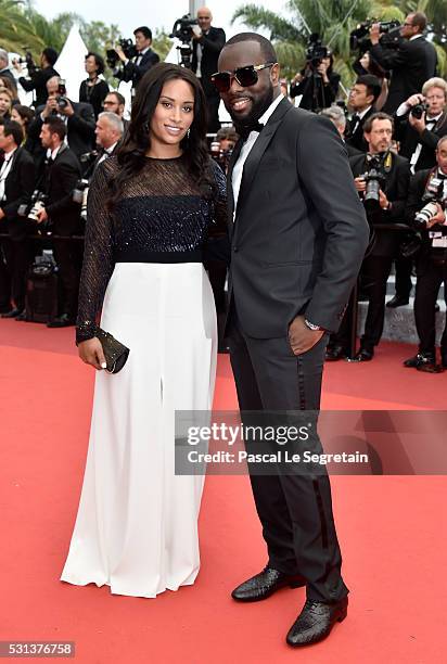 Maitre Gims and his wife DemDem attend "The BFG " premiere during the 69th annual Cannes Film Festival at the Palais des Festivals on May 14, 2016 in...