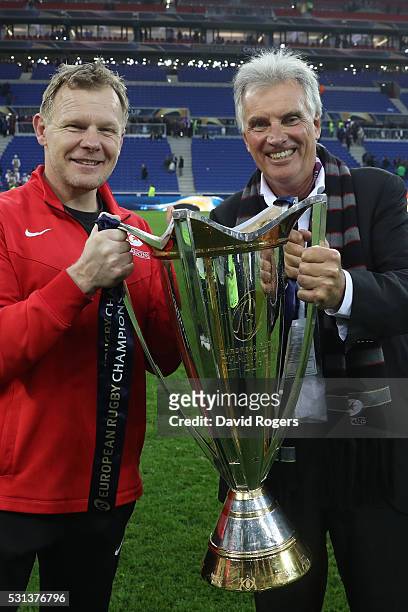 Director of Rugby Mark McCall and owner Nigel Wray of Saracens pose with the trophy after the European Rugby Champions Cup Final match between Racing...
