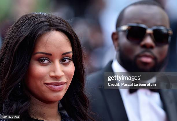 Maitre Gims and his wife DemDem attend "The BFG " premiere during the 69th annual Cannes Film Festival at the Palais des Festivals on May 14, 2016 in...