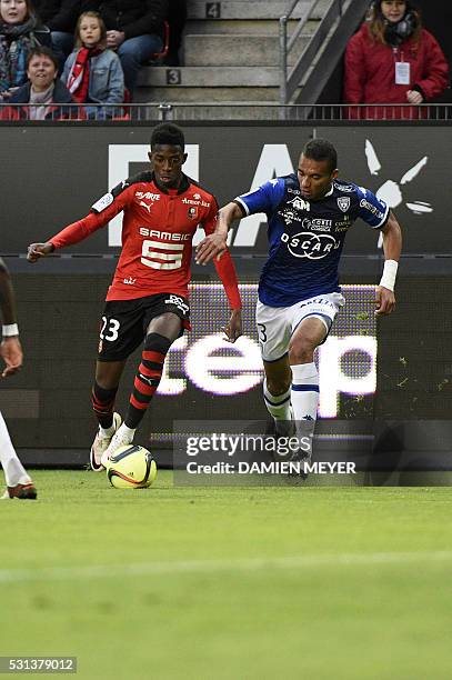 Rennes' French forward Ousmane Dembele vies with Bastia's French defender Alexander Djiku during the French L1 football match between Stade Rennais...