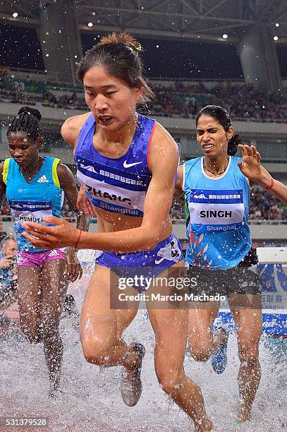 Xinyan Zhang of China runs in the Women��s 3000 Metres Steeple during the 2016 IAAF Diamond League meeting at Shanghai Stadiumon May 14, 2016 in...