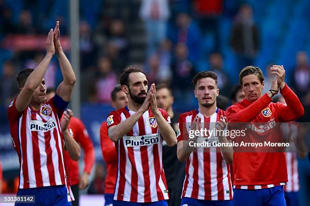 Atletico de Madrid players Fernando Torres , Saul Niguez , Juan Francisco Torres alias Juanfran and Gabi Fernandez greets the audience after the La...