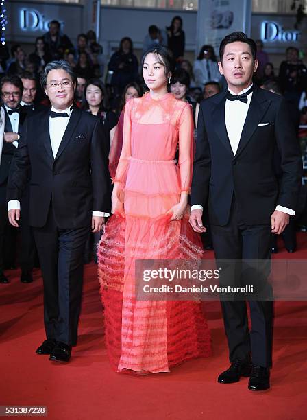 Park Chan-wook, Kim Min-Hee and Cho Jin-woong attend "The Handmaiden " premiere during the 69th annual Cannes Film Festival at the Palais des...