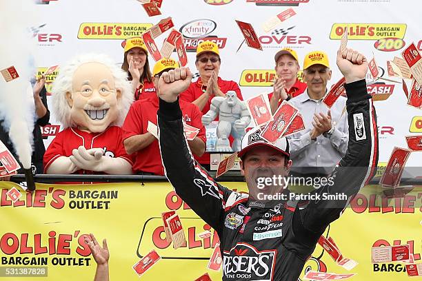 Erik Jones, driver of the Reser's Fine Foods Toyota, celebrates in Victory Lane after winning the NASCAR XFINITY Series Ollie's Bargain Outlet 200 at...