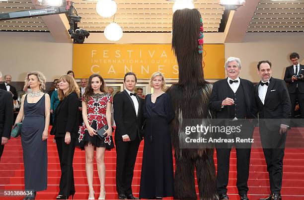 Lucy Russell, director Maren Ade, actors Ingrid Bisu, Trystan Puetter, Sandra Hueller, mascot of the movie and Thomas Loibl attend the "Toni Erdmann"...