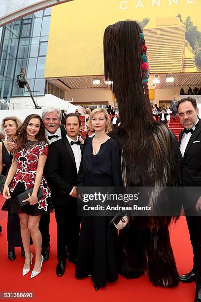 Lucy Russell, director Maren Ade, actors Ingrid Bisu, Trystan Puetter, Sandra Hueller, mascot of the movie and Thomas Loibl attend the "Toni Erdmann"...