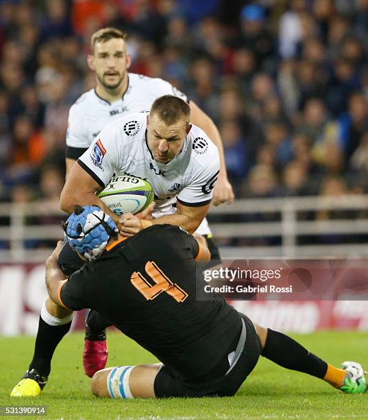 Coenie Oosthuizen of Sharks charges into Matias Alemanno of Jaguares during a match between Jaguares and Sharks as part of Super Rugby 2016 at Jose...