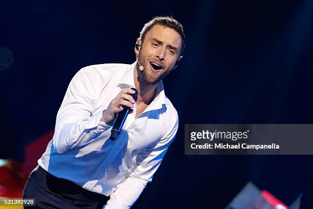 Host Mans Zelmerlow performs at the Ericsson Globe on May 14, 2016 in Stockholm, Sweden.