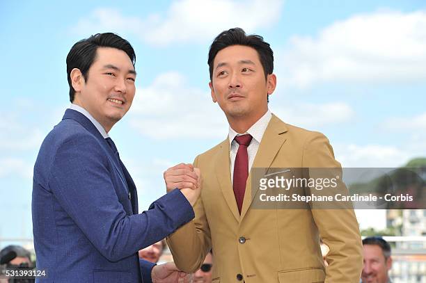 Actor Cho Jin-Woong and actor Ha Jung-Woo attend "The Handmaiden " photocall during the 69th annual Cannes Film Festival at the Palais des Festivals...