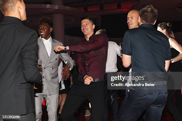 Robert Lewandowski dances as Music band, OneRepublic performs at the FC Bayern Muenchen Bundesliga Champions Dinner at the Postpalast on May 14, 2016...